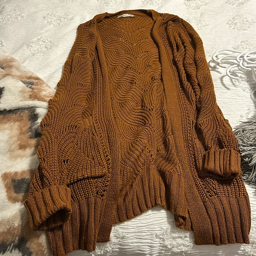 Burnt orange cardigan with beautiful detailing. Size x-small